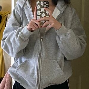 brandy melville grey zip up in perfect condition. super thick!